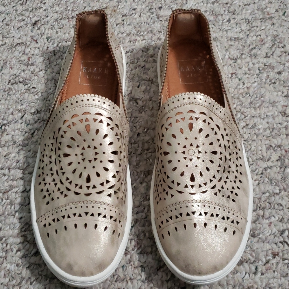 Very stylish, gold slip on shoes